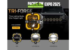 Flashtech booth display for TRI-FORGE Off-Road Light at PNWCEE 2025 showcasing DRL, Low Beam, and High Beam modes in front of a black Ford Bronco
