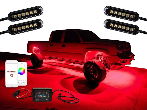 Flashtech RGBW Rock Light Kit featuring four high-powered LED rock lights, a Bluetooth controller, and app control. Displayed with a lifted truck illuminated in vibrant red underglow.
